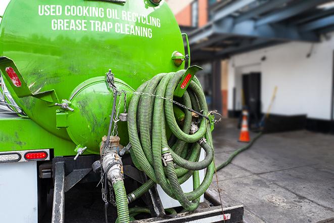 a large grease trap being pumped by a specialist in Amboy, WA